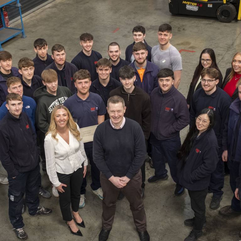 A group photo of a gathering of Forth Ports Apprentices from various departments