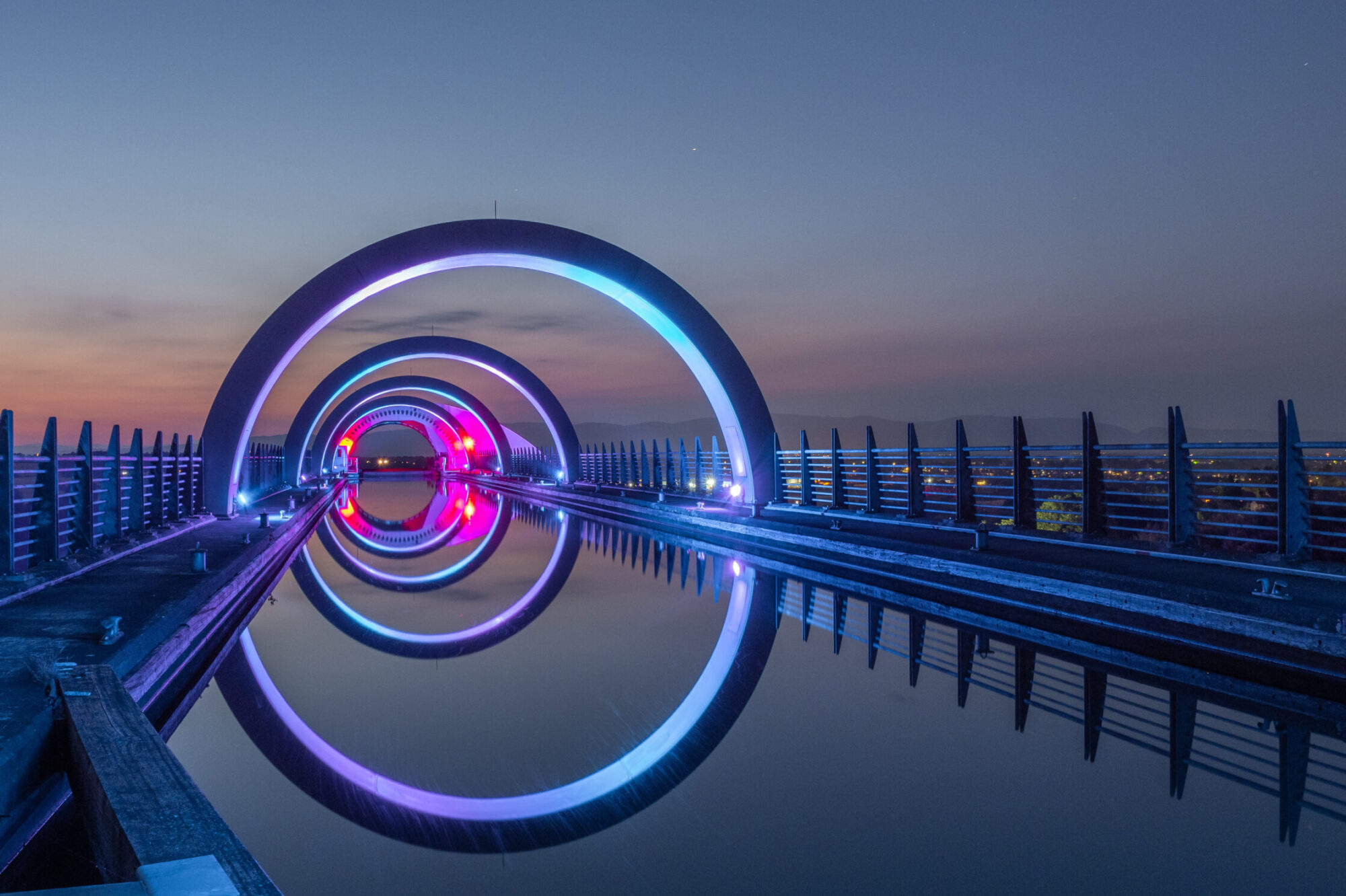 The canal leading to the top of the Falkirk Wheel. The Falkirk Wheel is a rotating boat lift in Scotland connecting the Forth and Clyde Canal with the Union Canal.