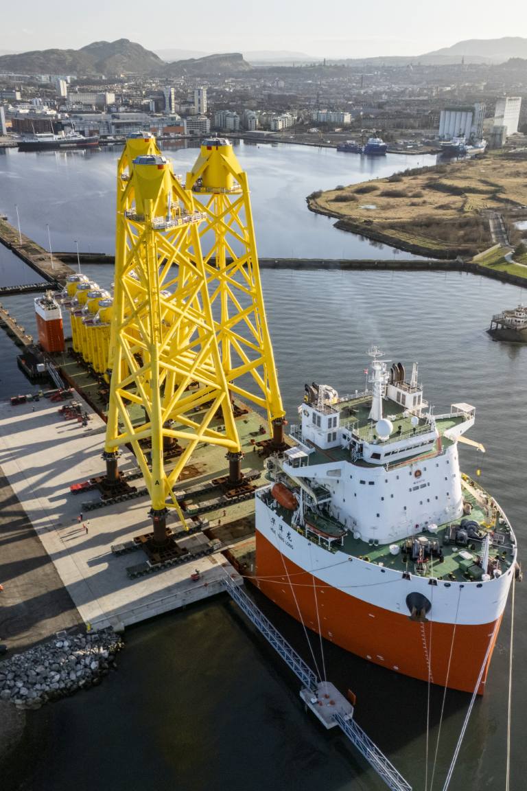 A vessel unloading windfarm Jackets at the leith port