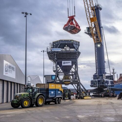 Rosyth Agri-hub offloading bulk goods via crane and tractor-trailer