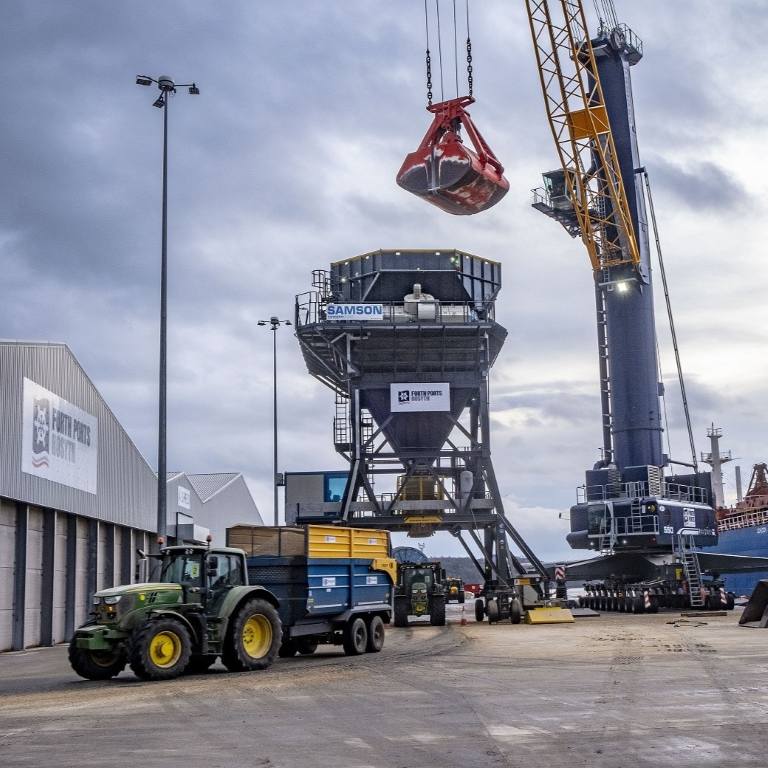Rosyth Agri-hub offloading bulk goods via crane and tractor-trailer