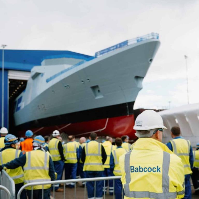 HMS Venturer Type 31 Frigate rolled out of the assembly hall at Rosyth in front of a crowd of Babcock staff